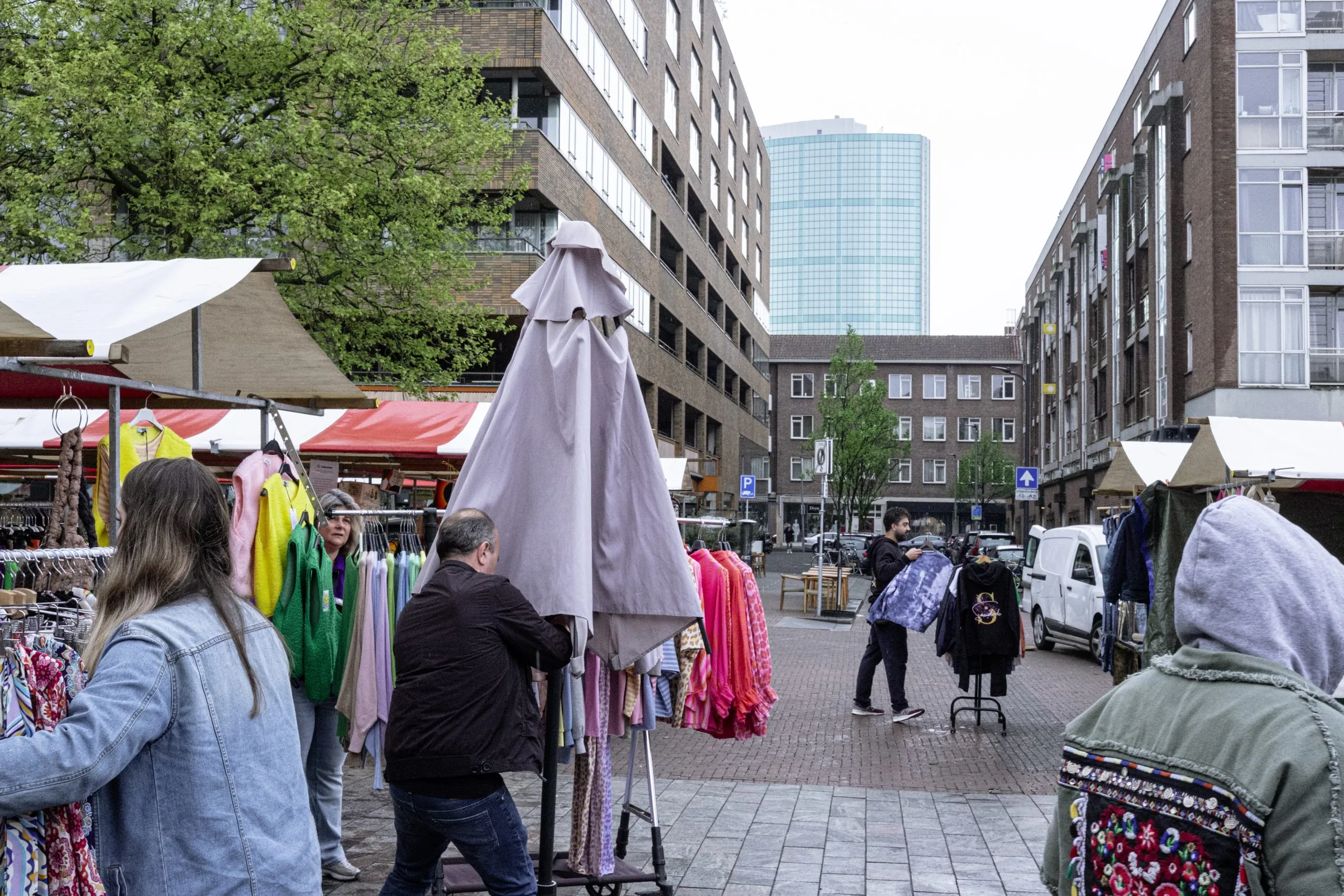 Street photography in Rotterdam the Netherlands of a market while the picture is in layers.