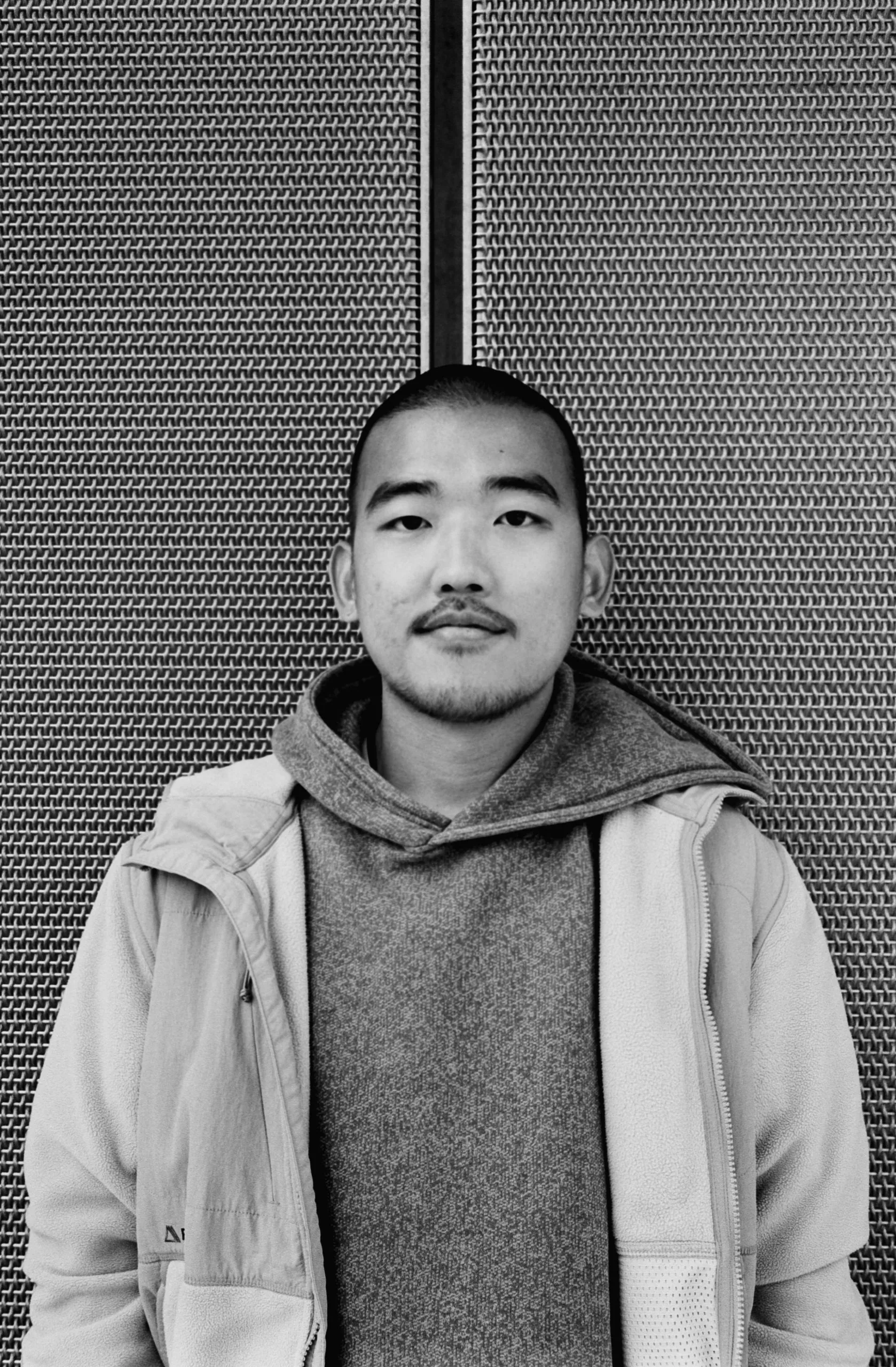 Street photography portrait in the Netherlands Rotterdam of a man posing on medium format film B&W.