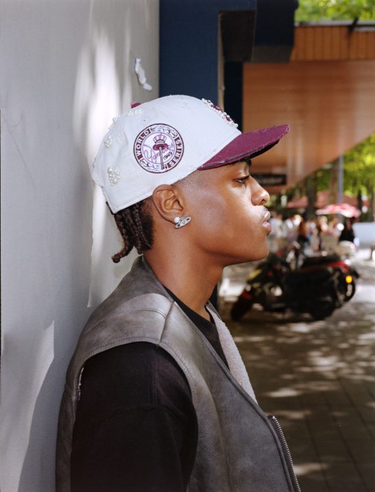 Photo taken with a fuji ga645 kodak gold 200 with on camera flash, you see a man posing.