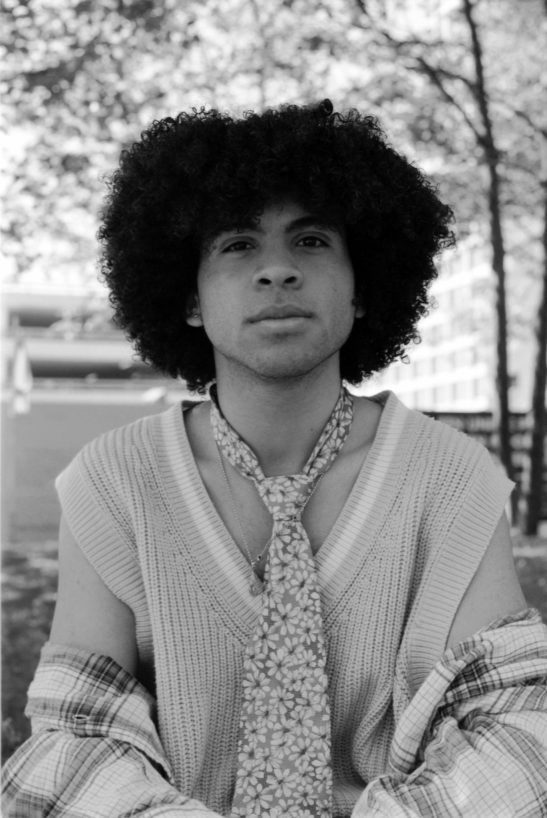 Man in fashion clothing and tie shot on 35mm film trix400.