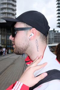Street portret young man tattoo rotterdam.