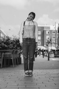 Street portrait of a woman posing in Rotterdam.